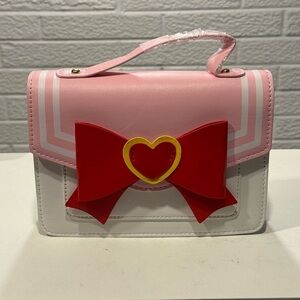 Mini Pink and White‎ Bag with Heart Motifs-New never been used.